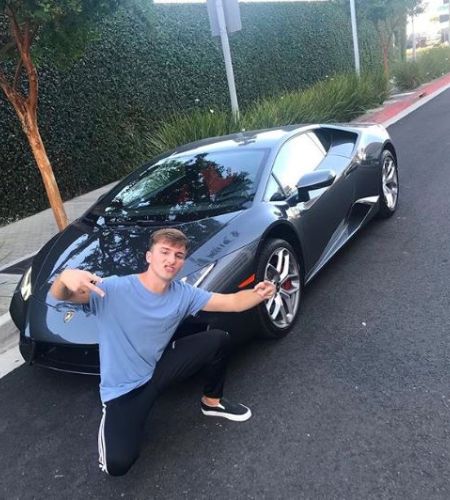 Lucas with his new Lamborgini car